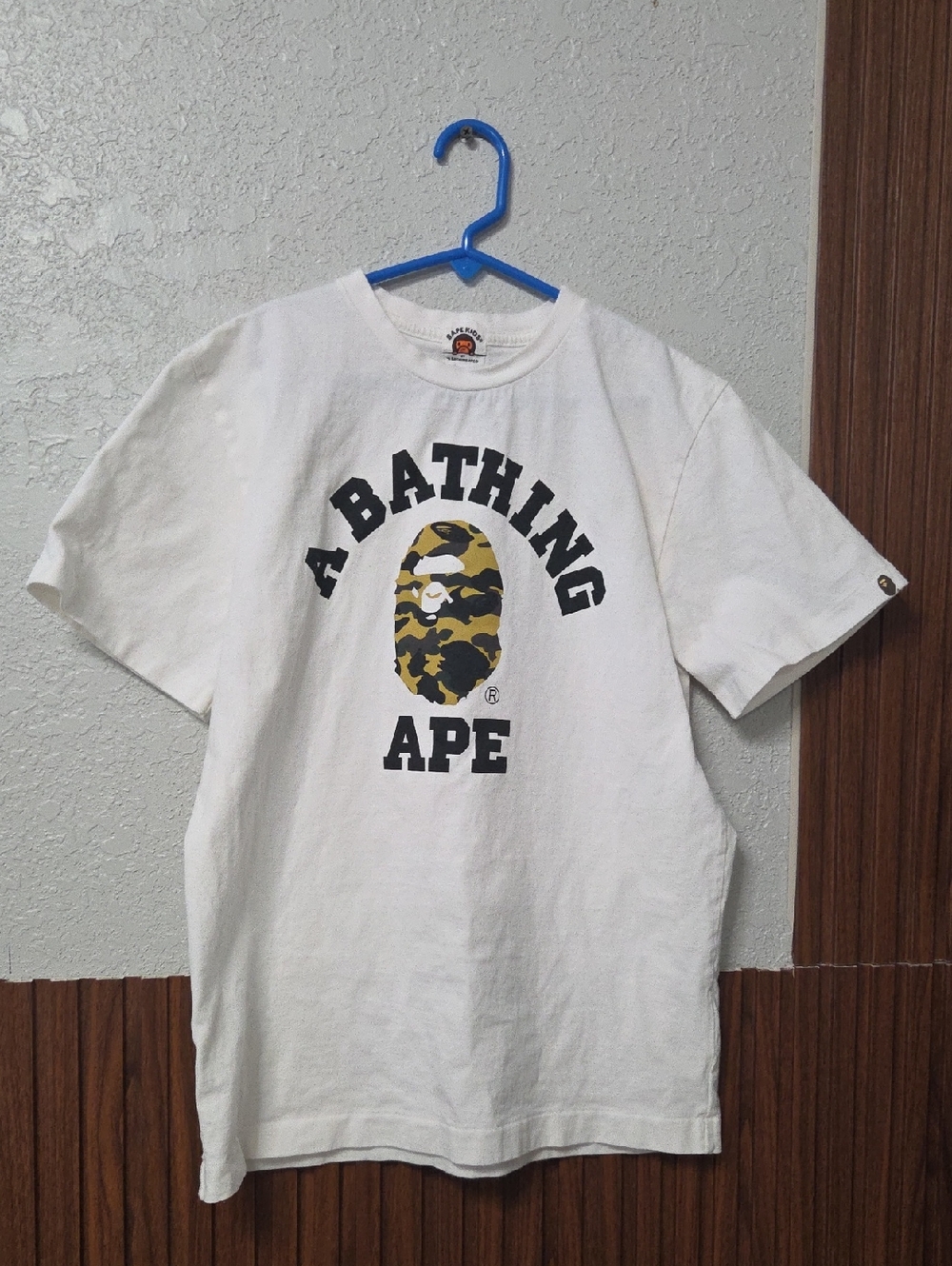A Bathing Ape White Tee with Yellow Camo Logo Size 12 To 14